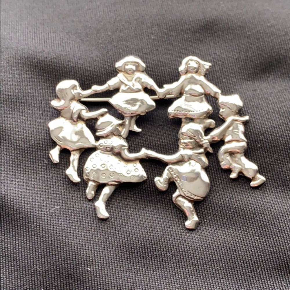 Adorable sterling brooch children playing design